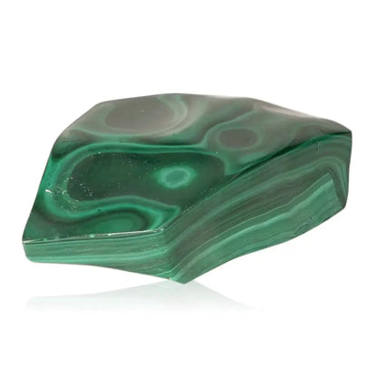 Malachite gemstone showcasing its natural elegance and soothing energy, known for alleviating depression and instilling hope.