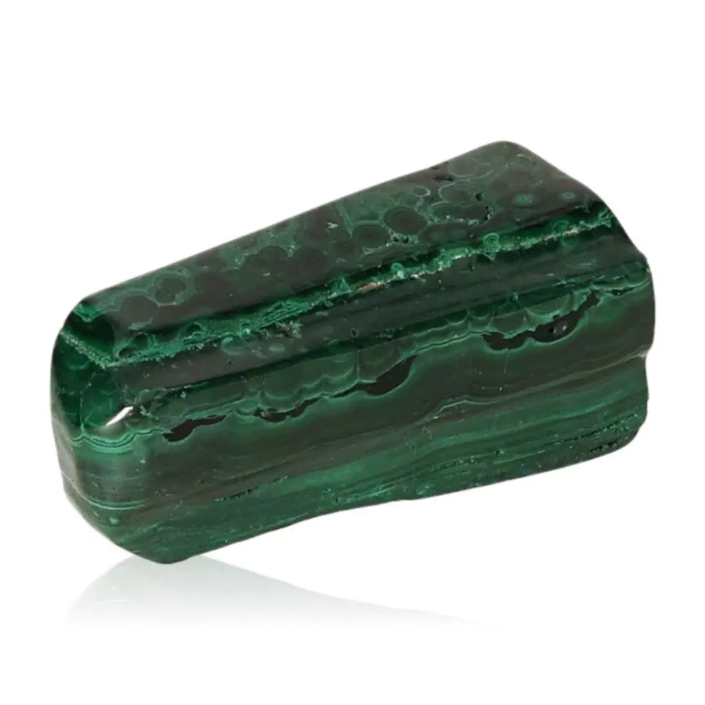 Polished malachite stone showcasing its vibrant green hues and natural patterns, embodying nature's soothing and energizing properties.