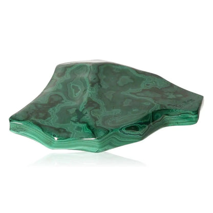 Polished green malachite stone with swirling patterns, symbolizing nature's soothing energy and transformative power. 