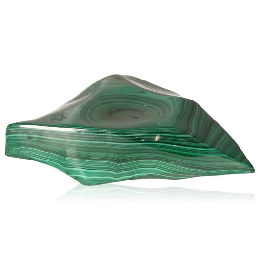 Smooth polished malachite stone with vibrant green bands, symbolizing resilience and tranquility. Ideal for spiritual energy and courage.