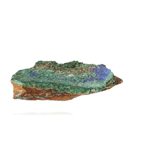 Raw green and blue malachite gemstone slice showcasing vibrant colors and intricate patterns on a white background.