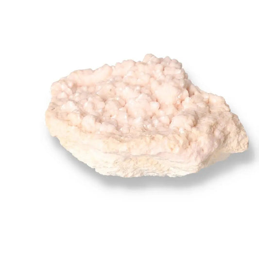 Manganocalcite gemstone from Sylvia Crystals, a delicate pink "Stone of Love" for compassion, emotional healing, and conscious luxury.