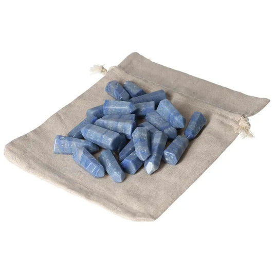 Mini point blue quartz stones, 0.5 KG, 25 pieces, on a beige cloth bag. Enhances communication and emotional balance.