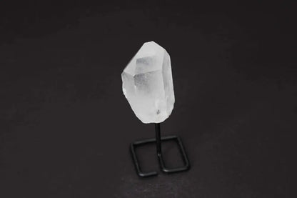 Natural Clear Quartz Point on Stand, perfect for amplifying energy and enhancing clarity, ideal for meditation and manifestation.