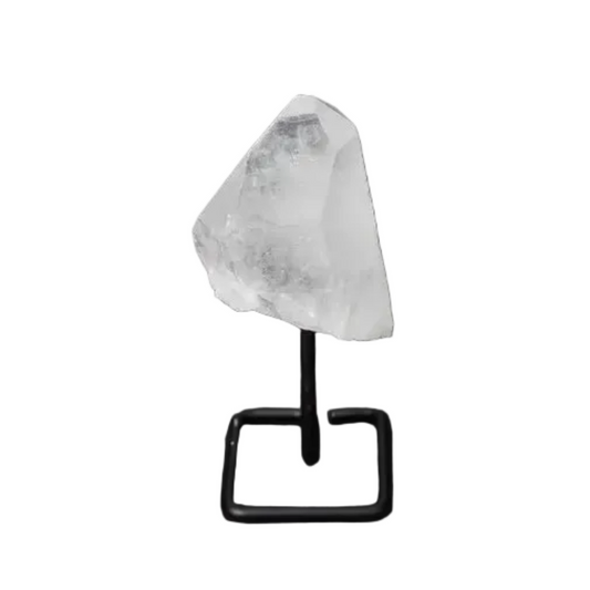 Natural Clear Quartz Point on Stand for energy alignment and meditation, elegantly displayed to amplify and illuminate space.