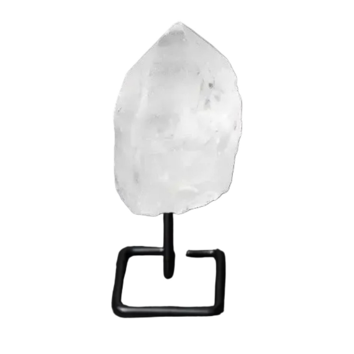 Natural clear quartz point on a modern stand, known as a Master Healer, amplifying energy for meditation and clarity.