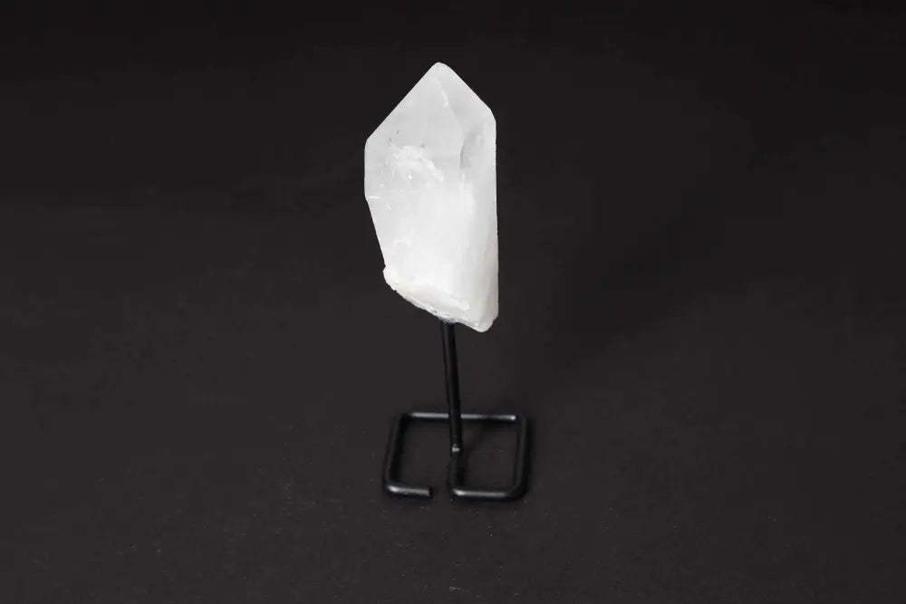 Natural clear quartz point on stand for energy amplification and clarity, ideal for meditation and alignment, "Master Healer" display piece.