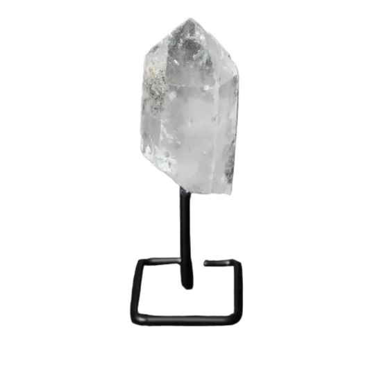 Clear Quartz point on a modern stand, enhancing energy and focus, ideal for meditation and decoration.