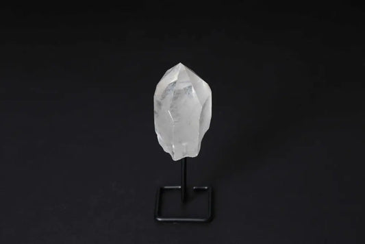 Clear Quartz Point with Stand for Energy Amplification and Clarity on Dark Background