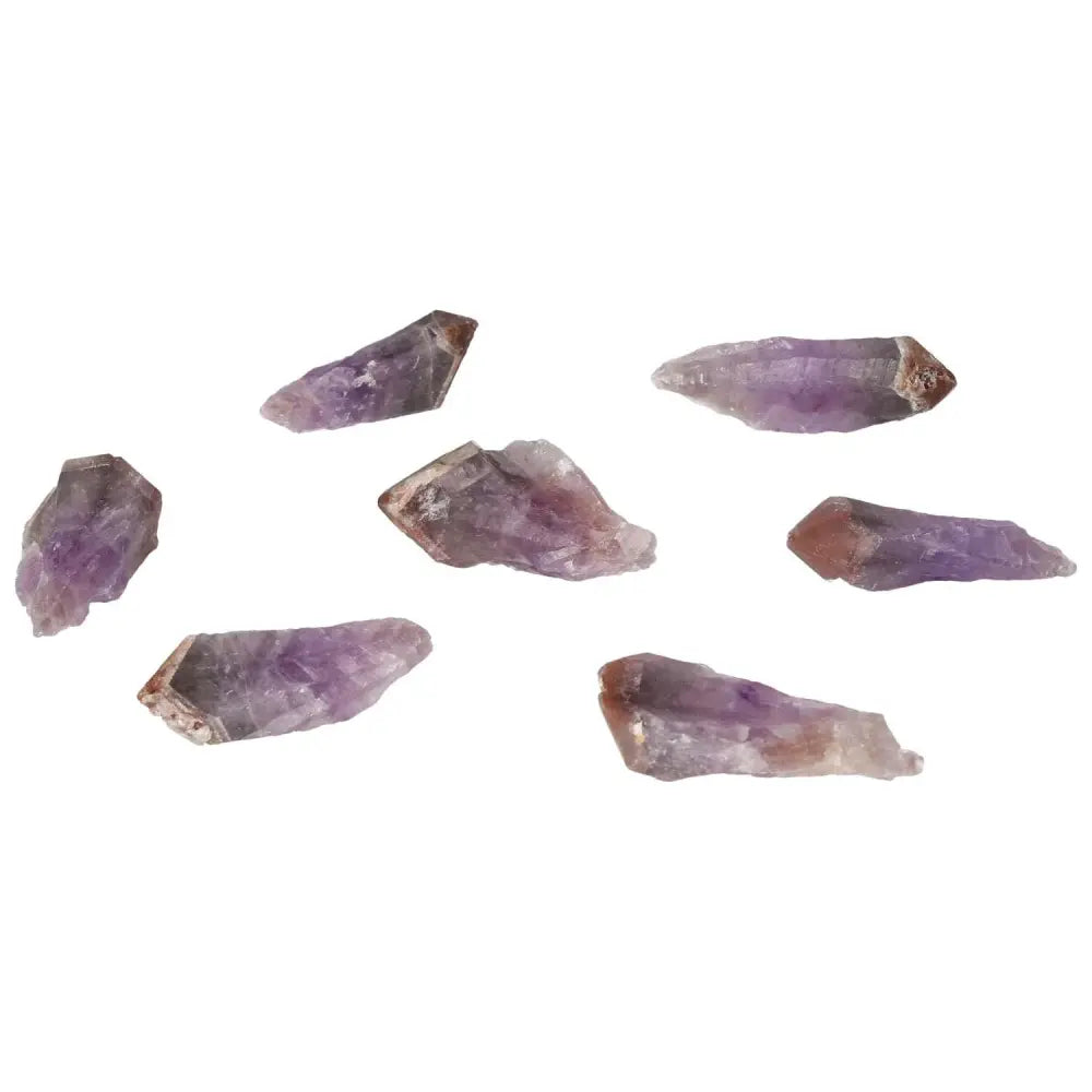 Natural Point Amethyst M crystals for stress relief and energy flow, enhancing focus and emotional stability, by Sylvia Crystals.