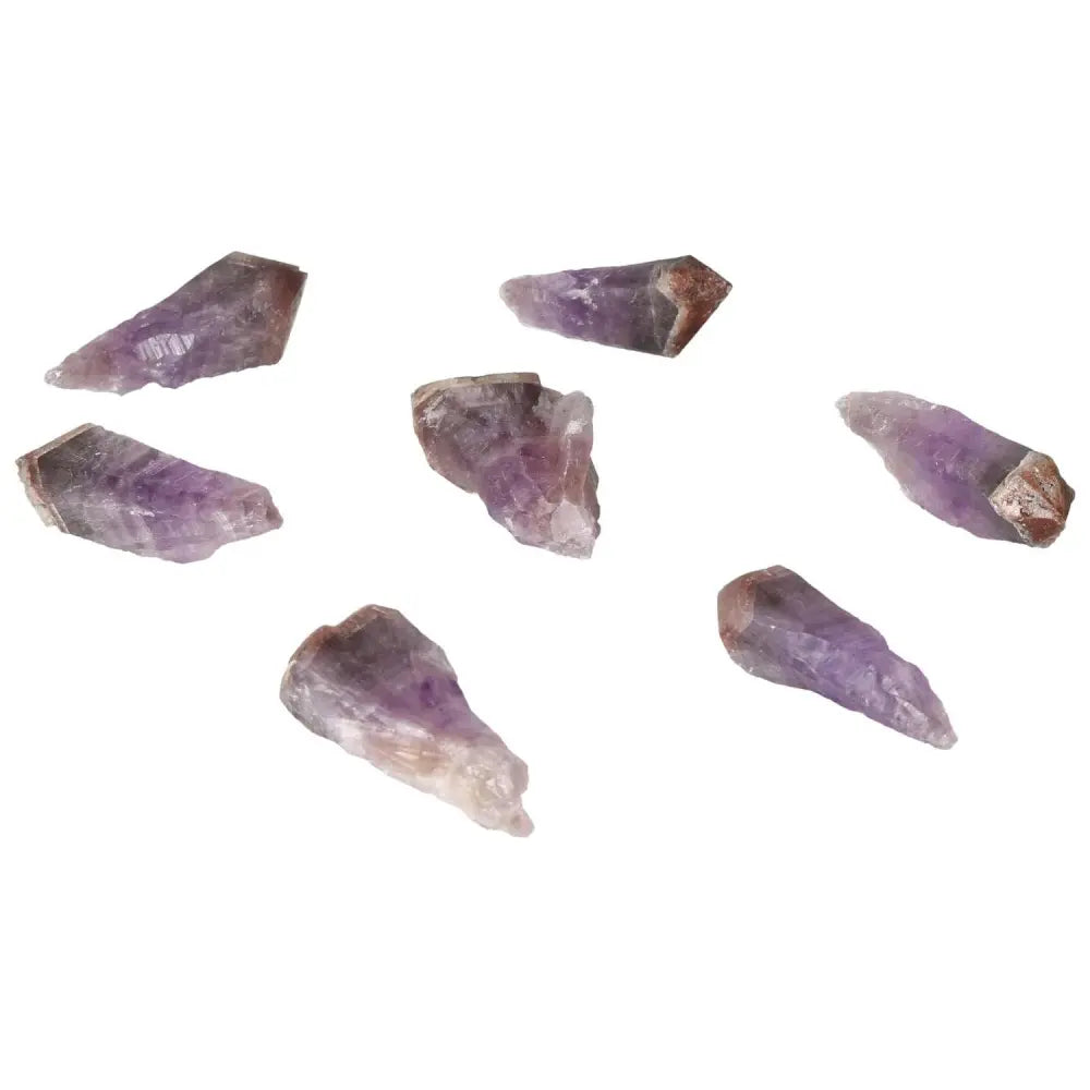 Natural Point Amethyst M crystals from Sylvia Crystals, enhancing emotional stability and energy flow with handcrafted elegance.