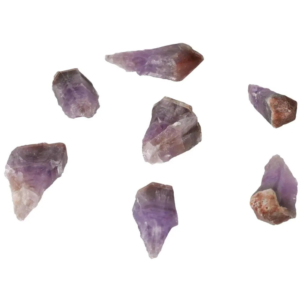 Collection of Natural Point Amethyst M crystals, handpicked for stress relief and energy flow enhancement, from Sylvia Crystals.