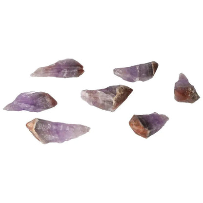 Collection of Natural Point Amethyst M crystals from Sylvia Crystals, known for enhancing emotional stability and stress relief.