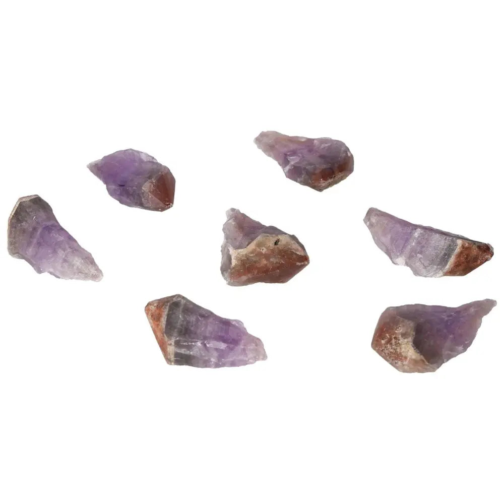 Natural Point Amethyst M crystals from Sylvia Crystals, enhancing emotional stability and energy flow with serene power.