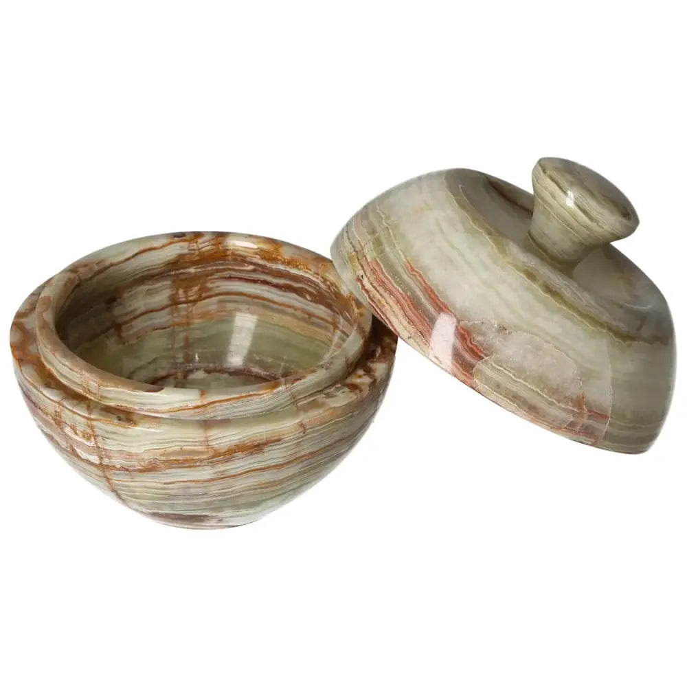 Elegant 10cm onyx bowl with lid showcasing natural veining and smooth finish, perfect for adding sophistication to home décor.