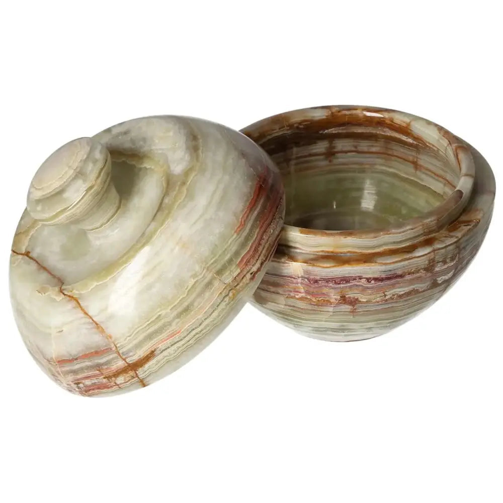 Onyx 10cm bowl with lid showcasing natural veining, adds timeless elegance and warmth to décor, carved from premium polished onyx.