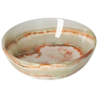 Onyx bowl 12.5 cm with polished surface and unique veining, adds elegance to décor with natural variations and translucency.