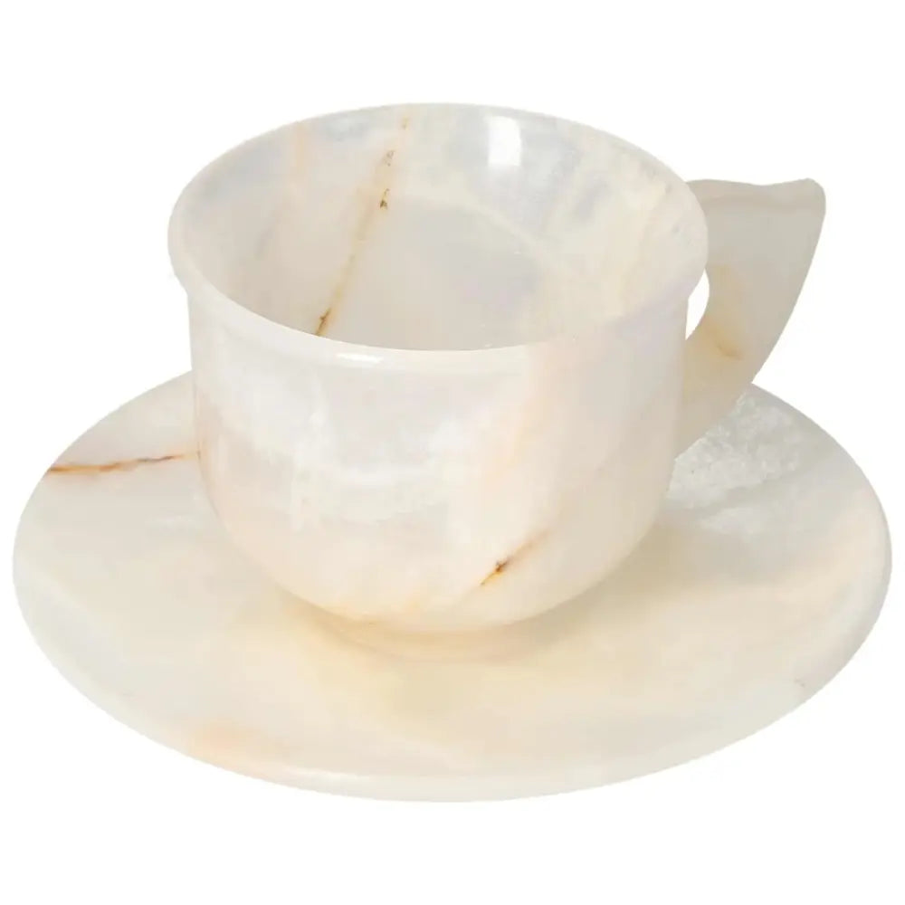Exquisite off-white onyx coffee cup and plate set, showcasing unique natural patterns, perfect for enhancing your coffee ritual.