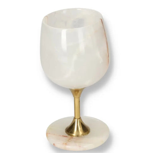 Exquisite onyx wine glass with a smooth, polished surface and unique veining, featuring a premium off-white finish and elegant design.