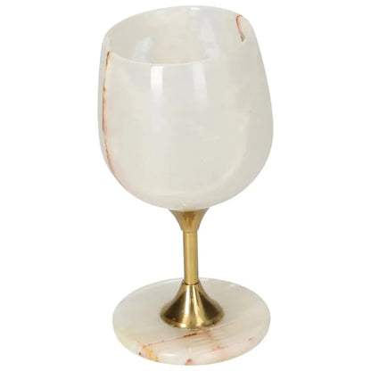 Elegant off-white onyx wine glass with natural veining and polished surface, featuring a gold-colored stem for enhanced sophistication.