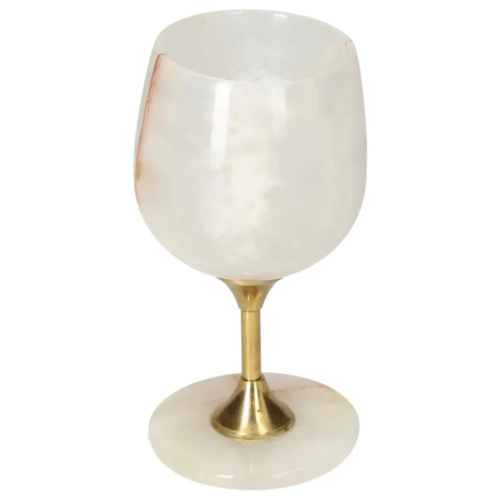 Elegant onyx wine glass with unique veining, featuring a polished gold stem and base, perfect for sophisticated gatherings.
