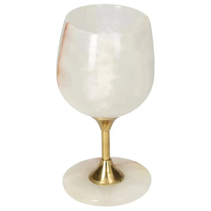 Elegant onyx wine glass with unique veining, featuring a polished gold stem and base, perfect for sophisticated gatherings.