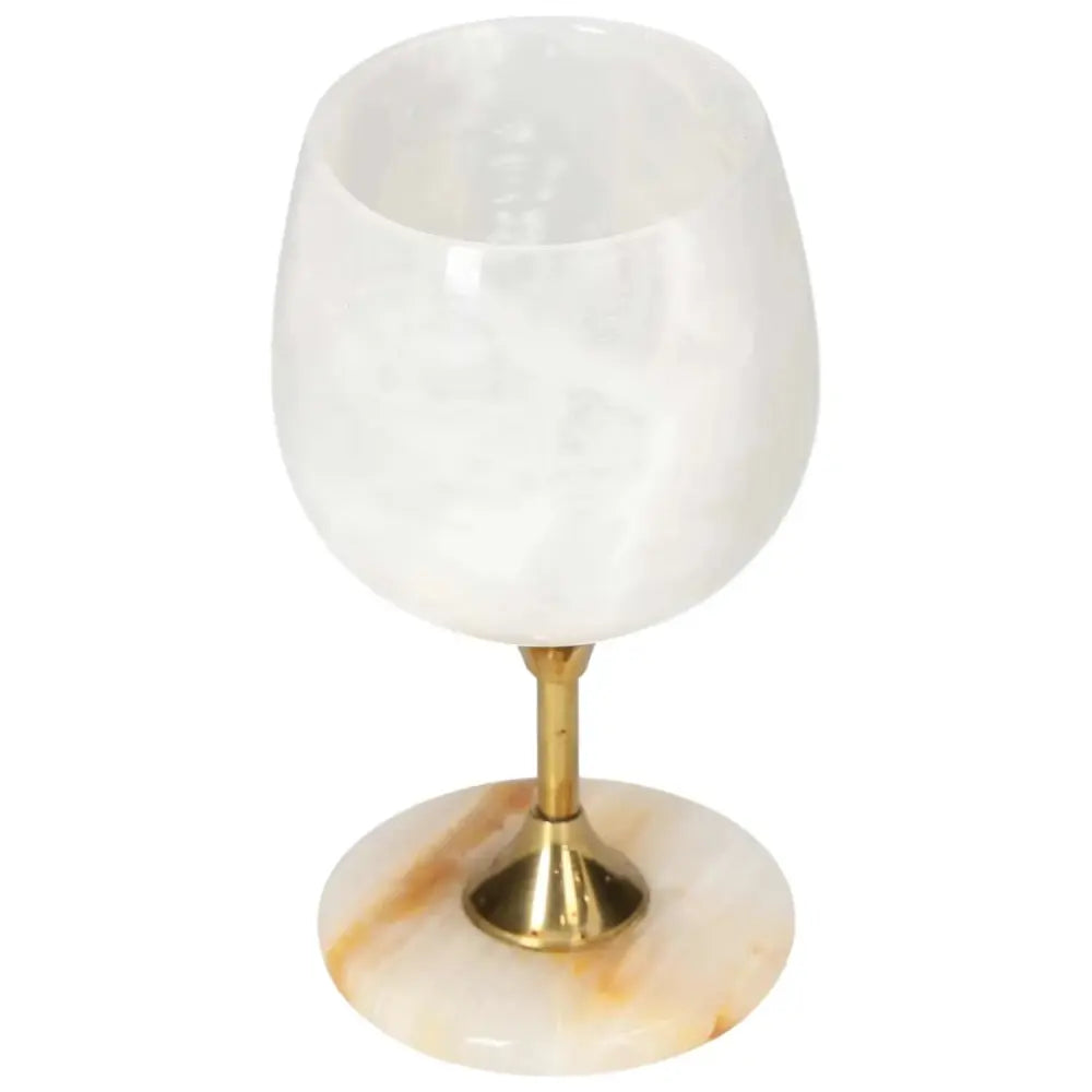 Elegant off-white onyx wine glass with natural veining, polished finish, and gold stem, perfect for sophisticated occasions.