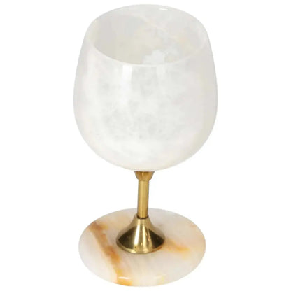 Exquisite off-white onyx wine glass with unique veining and gold stem, perfect for elegant occasions.
