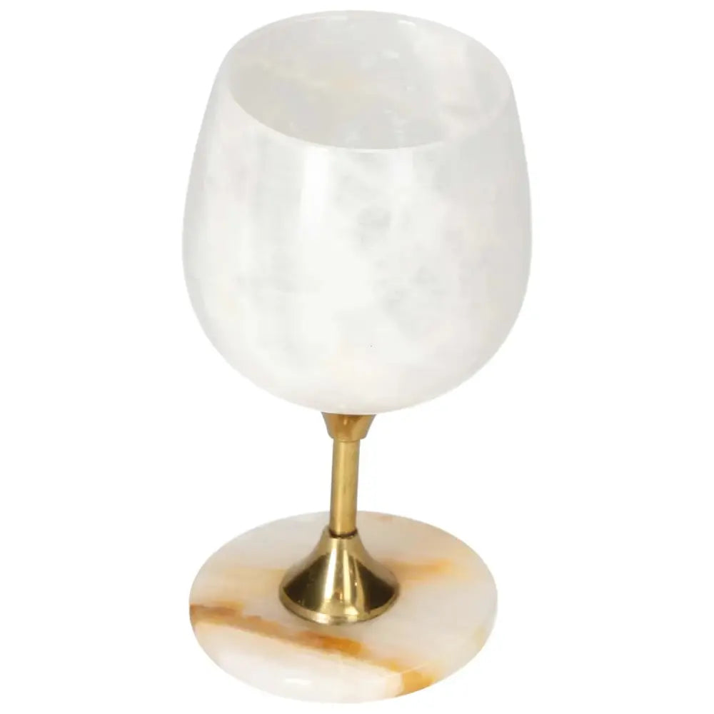 Elegant onyx wine glass with unique color variations and polished finish, featuring a gold stem for sophisticated wine tasting.