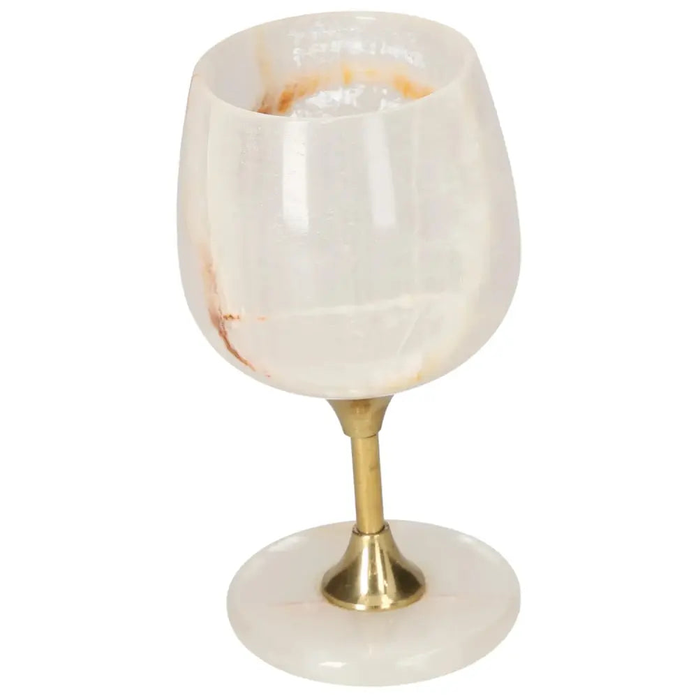 Exquisite off-white onyx wine glass with unique veining, polished surface, and elegant design, perfect for fine drinking occasions.