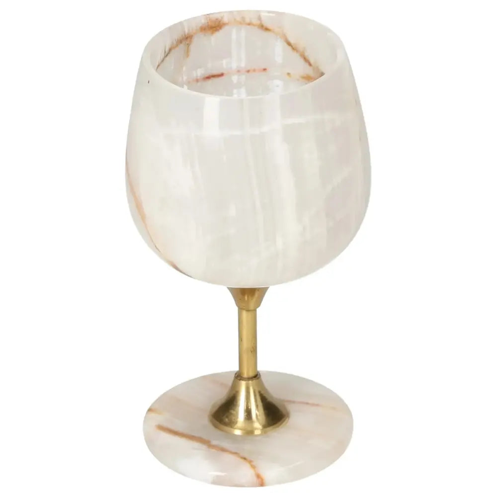 Elegant onyx wine glass with unique veining, featuring a polished finish and golden stem, enhancing any fine drinking experience.