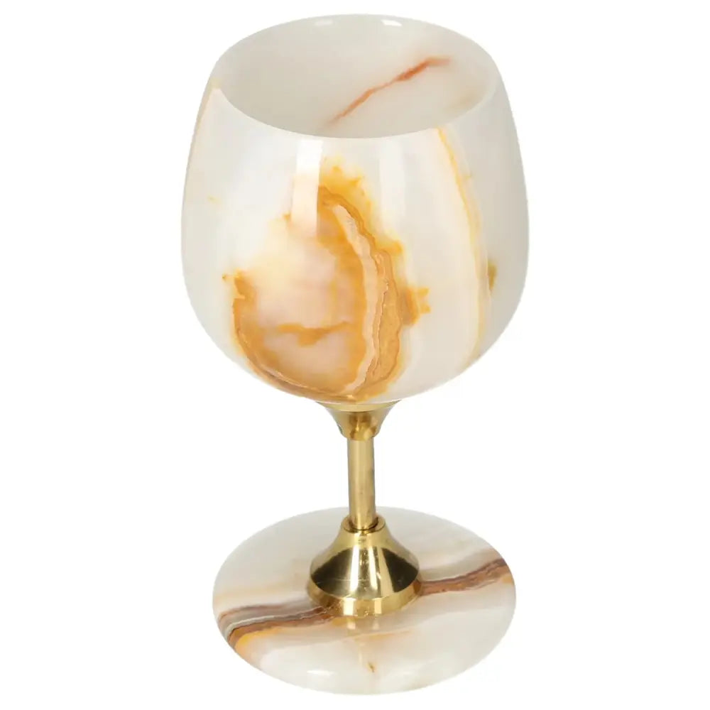 Exquisite onyx wine glass with unique beige and brown veining, polished finish, and brass stem for elegant dining and special occasions.