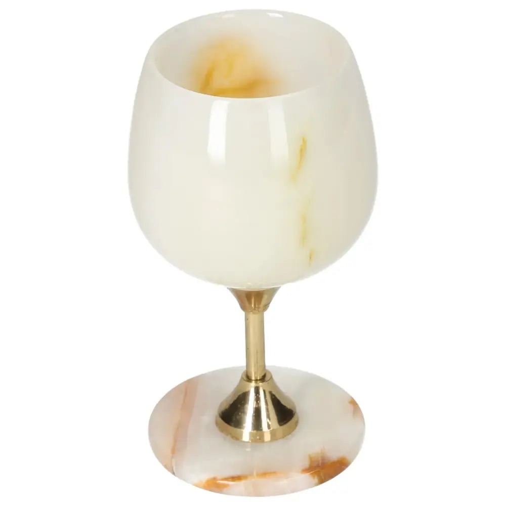 Exquisite off-white onyx wine glass with unique veining, polished surface on elegant stem, perfect for fine drinking occasions.