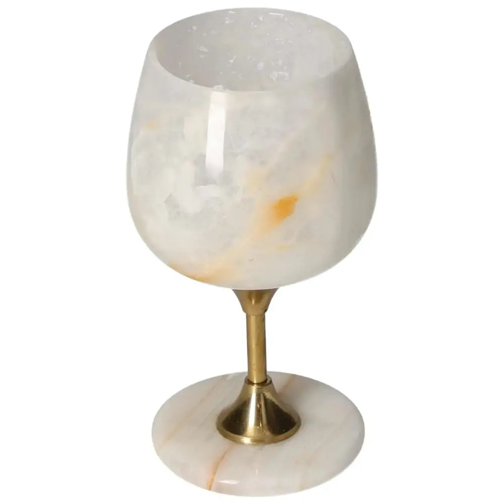 Elegant onyx wine glass with unique veining and polished finish, perfect for sophisticated dining occasions.