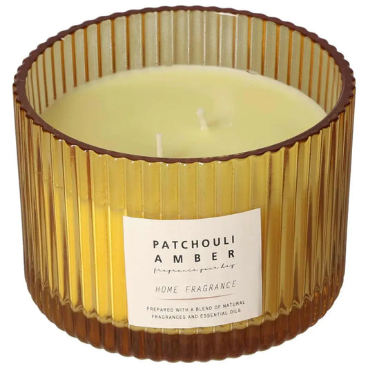 Patchouli Amber scented candle in an amber glass jar, illustrating luxury and eco-friendly craftsmanship for home fragrance enthusiasts.