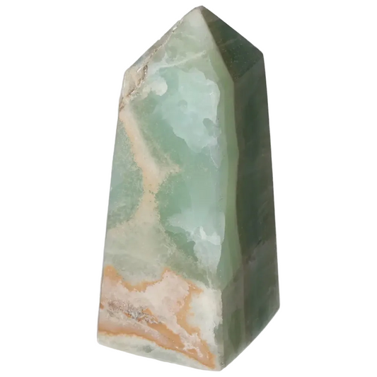 Pistachio Calcite Tower crystal with pale green hues, perfect for bringing calm and harmony to any space through its soothing energy.
