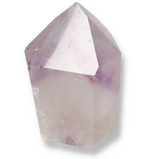Polished Amethyst Obelisk by Sylvia Crystals, known for stress reduction and luxury appeal, showcasing a harmonious blend of beauty and spirituality.