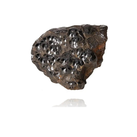 Shimmering polished botryoidal hematite crystal, embodying stability and strength, enhances energy and shields against negativity.