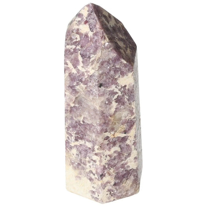 Polished Lepidolite Obelisk by Sylvia Crystals, showcasing purple hues and refined elegance for emotional harmony and spiritual tranquility.