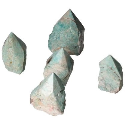 Polished Point Amazonite crystals showcasing refined elegance and harmonious properties, from Sylvia Crystals collection.