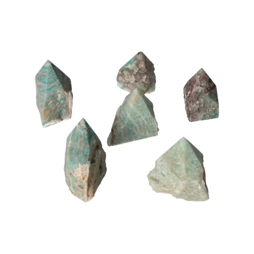 Polished Point Amazonite S crystals exhibit a calming serenity, ideal for releasing fear and invoking security, from Sylvia Crystals.
