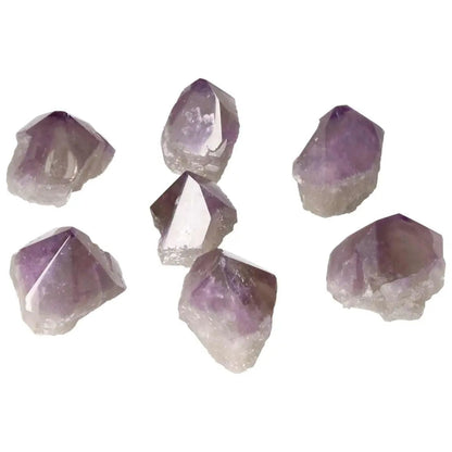 Seven polished amethyst crystals showcasing their vibrant purple hues, ideal for stress relief and enhancing concentration.
