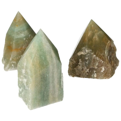 Three polished green quartz points with hematite inclusions, showcasing their unique textures and vibrant hues.