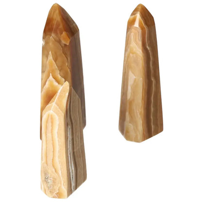 Polished Point Honey Calcite L crystal by Sylvia Crystals showcasing its smooth surface and honey-like hue for prosperity and abundance.