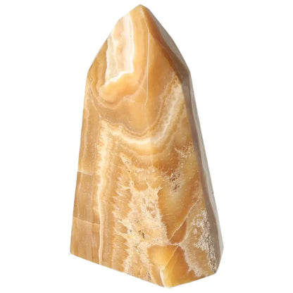 Polished Point Honey Calcite crystal with vibrant golden hues, known for attracting prosperity and success, from Sylvia Crystals.