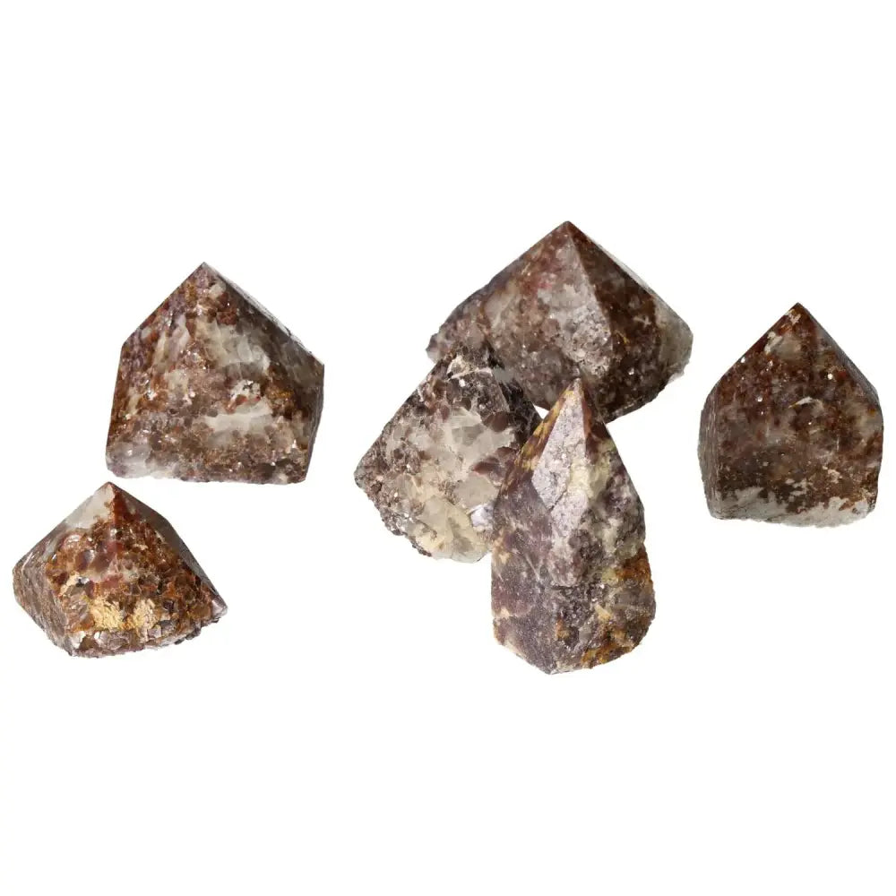 Polished lepidolite crystal points showcasing luxury and emotional balance from Sylvia Crystals.