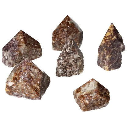 Polished Point Lepidolite crystals from Sylvia Crystals, emphasizing luxury, peace, and emotional balance.