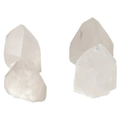 Four polished point quartz crystals from Sylvia Crystals, ideal for spiritual alignment and chakra connection.