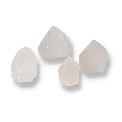 Polished Point Quartz S crystals from Sylvia Crystals, offering luxury and powerful energy for enhanced living spaces.