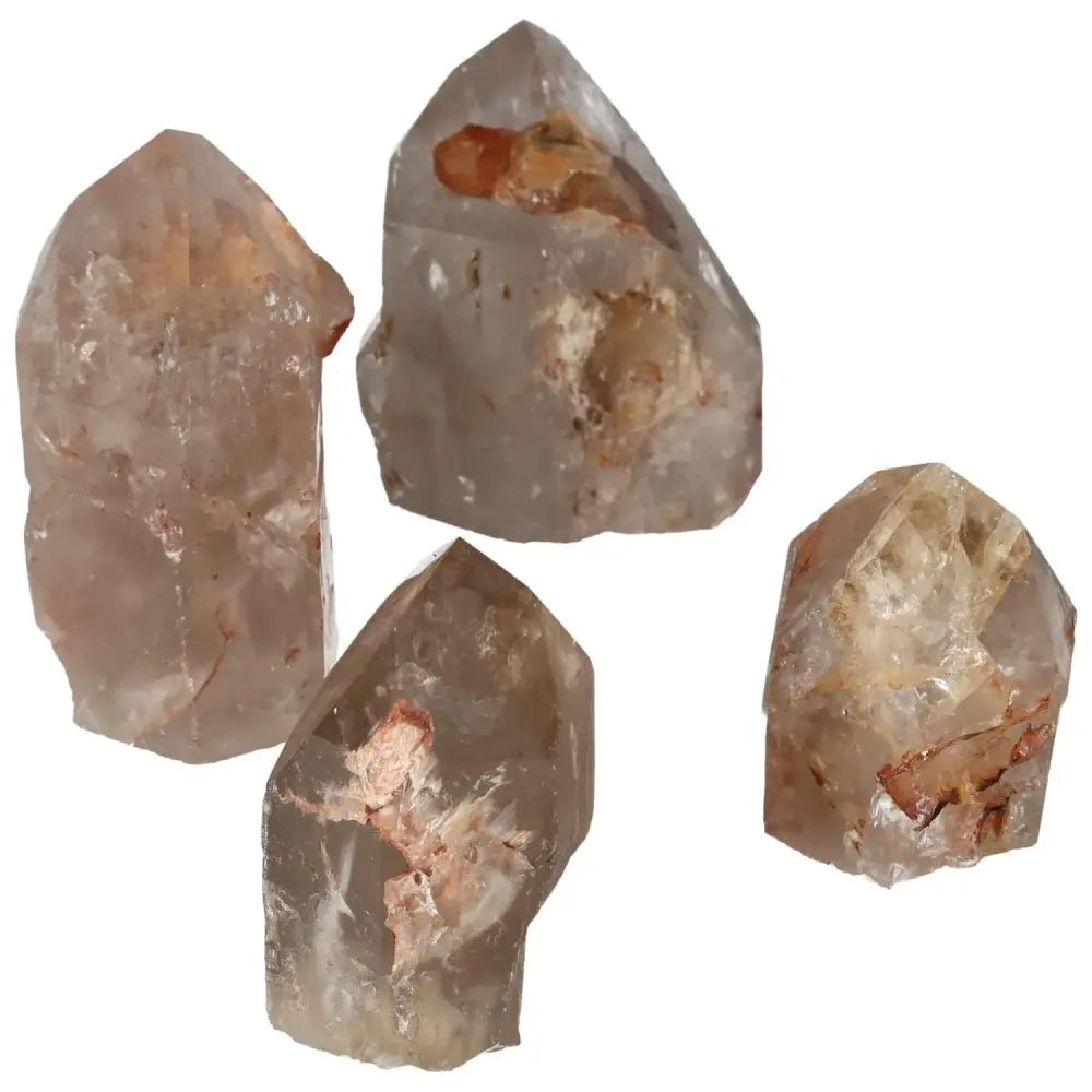 Polished Point Quartz With Hematite L from Sylvia Crystals, showcasing premium quality stones with clear quartz and hematite accents.